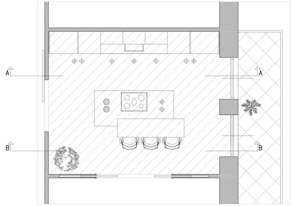 cucina con portale e isola pianta